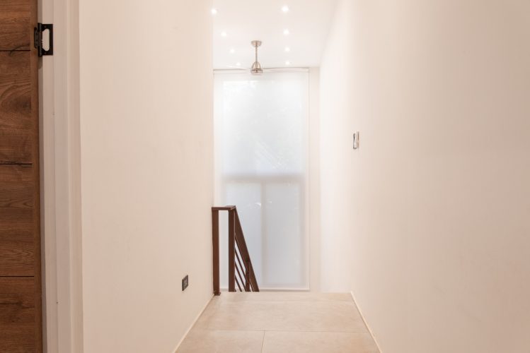 View of the stairs from second floor